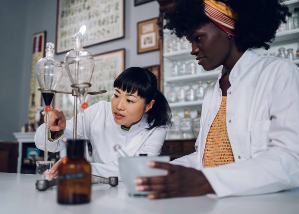 multiracial-pharmacy-workers-are-pointing-and-look-2023-11-27-05-28-11-utc